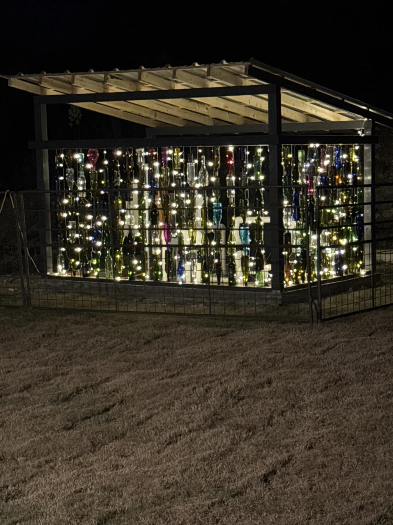 Illuminated artisan bottle wall
