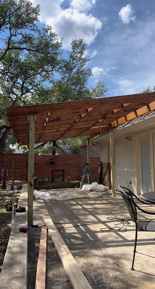 Wood framing during construction of a covered porch.