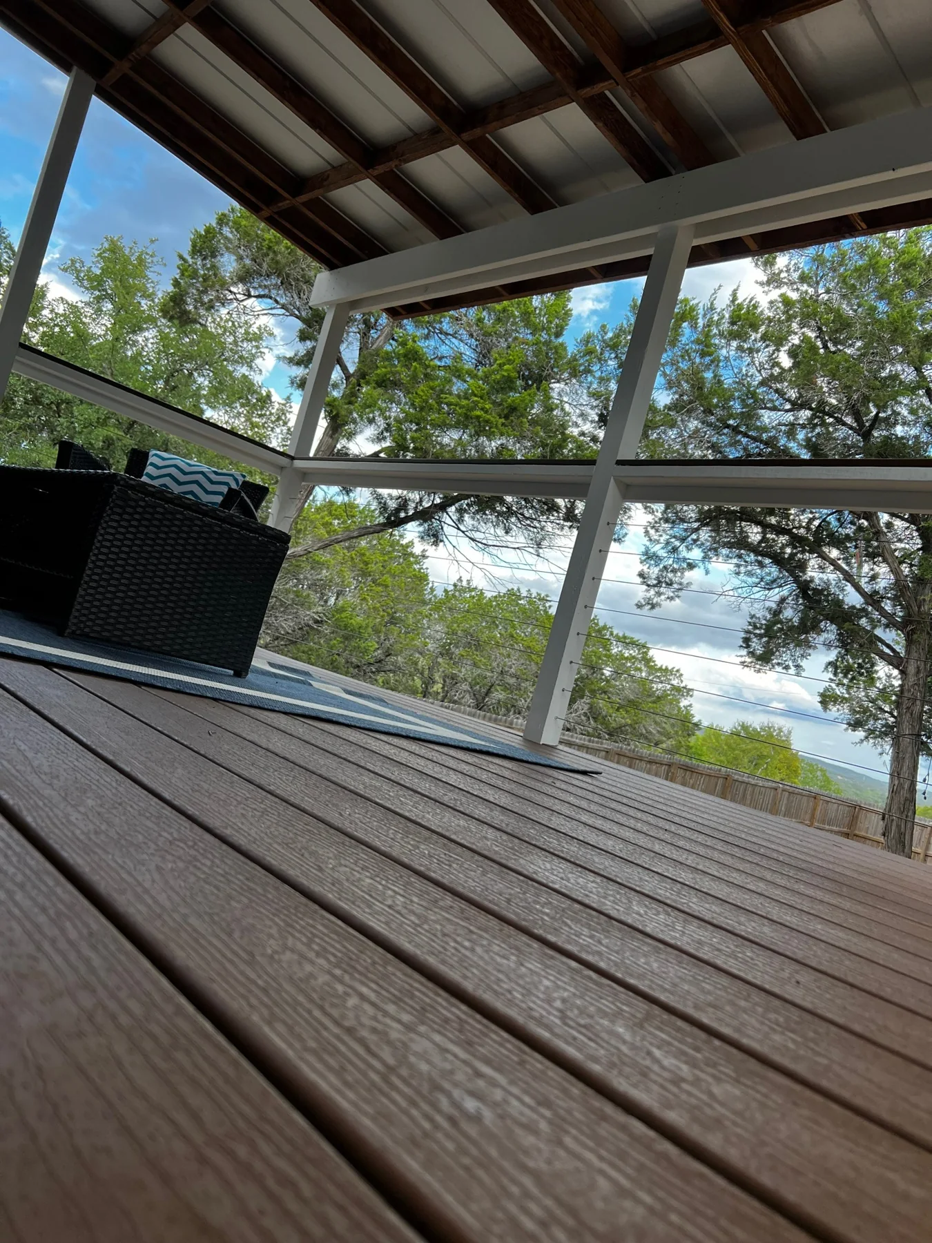 Finished covered deck and cable railing