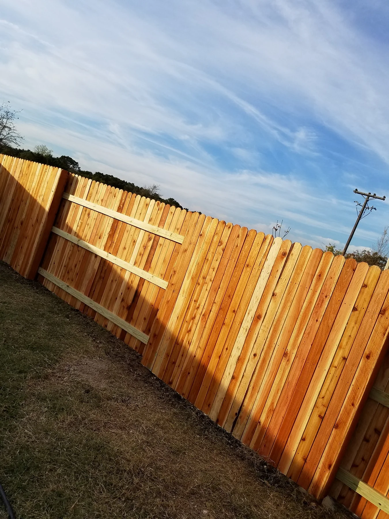 Alternating cedar fence