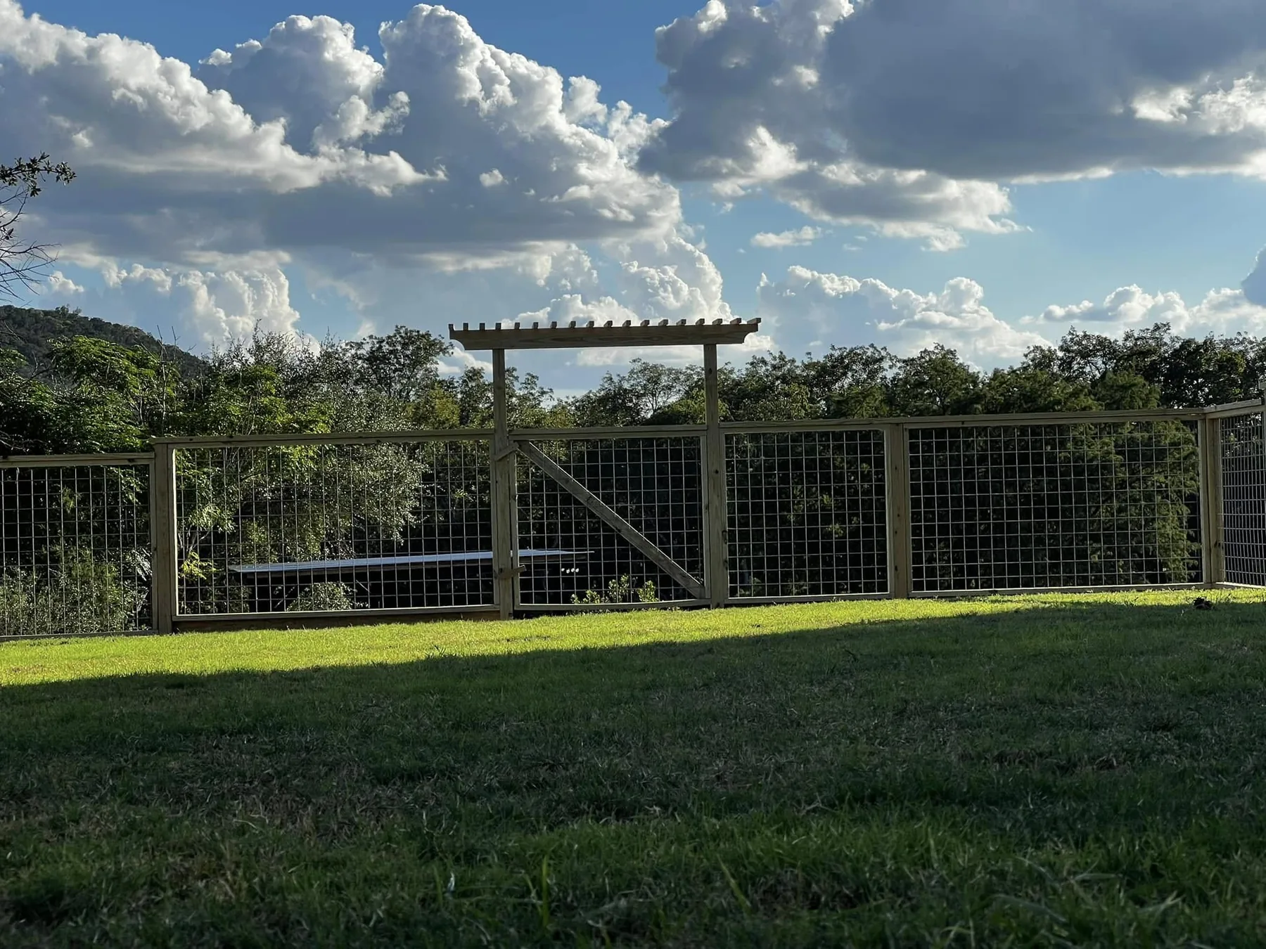 Wood framed hog panel fence